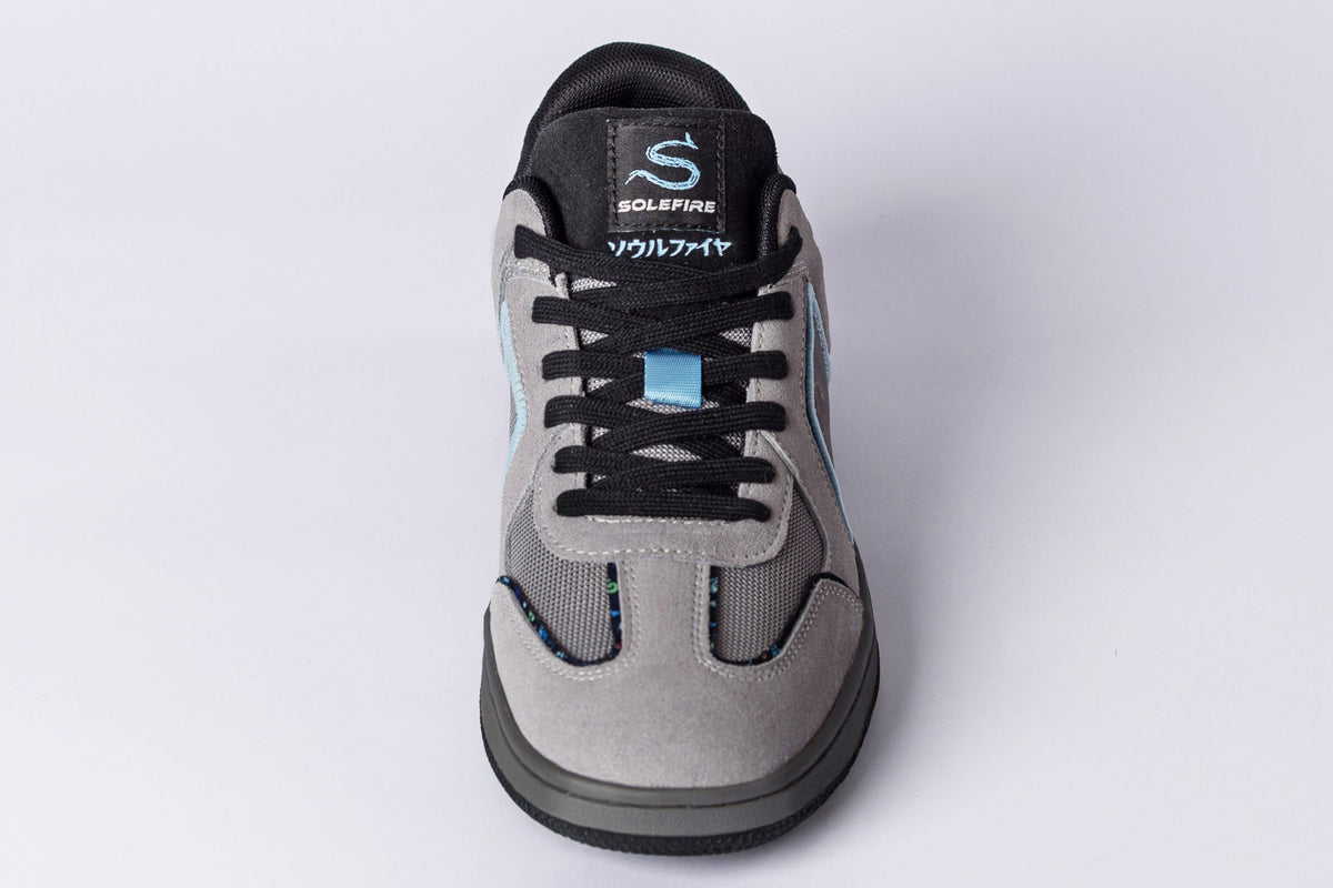 SOLEFIRE Tokyo Nights low-top sneaker in grey suede and mesh with black laces and sky blue accent details